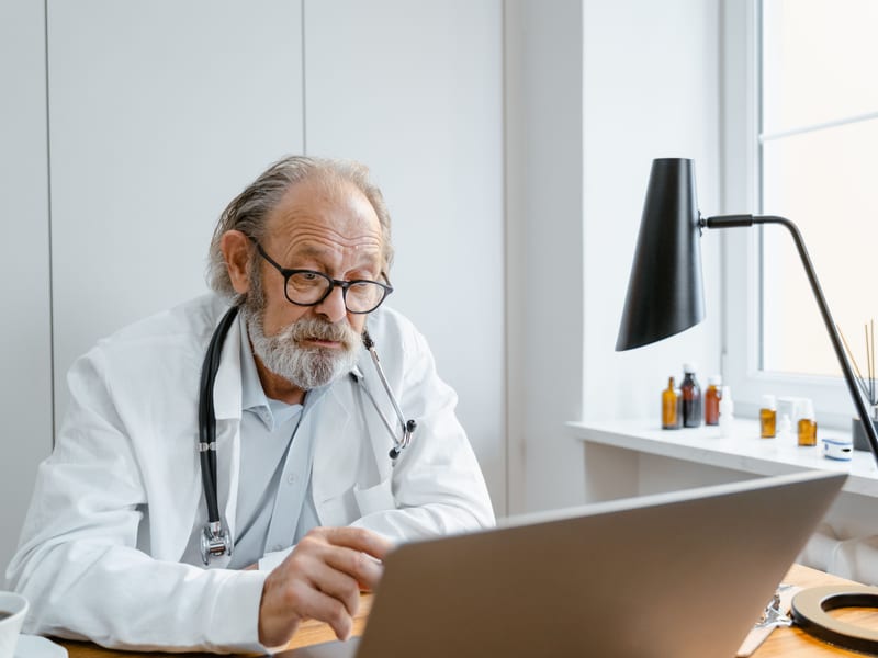 Licensed healthcare provider consulting with a patient